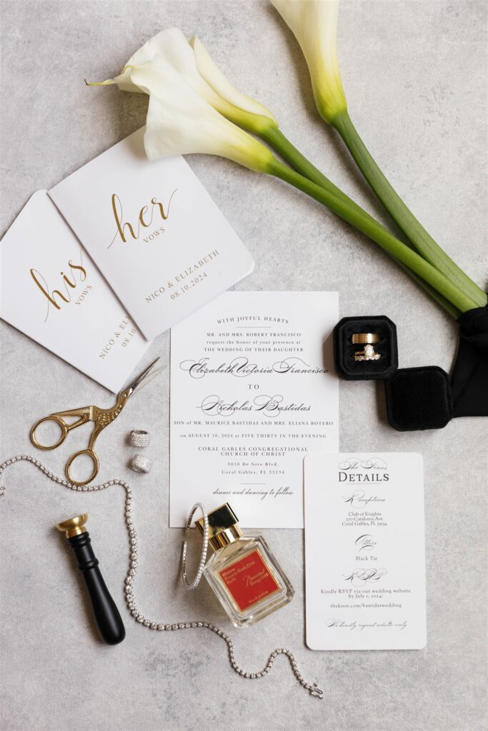 Wedding invitation suite with calla lilies, rings and bridal perfume