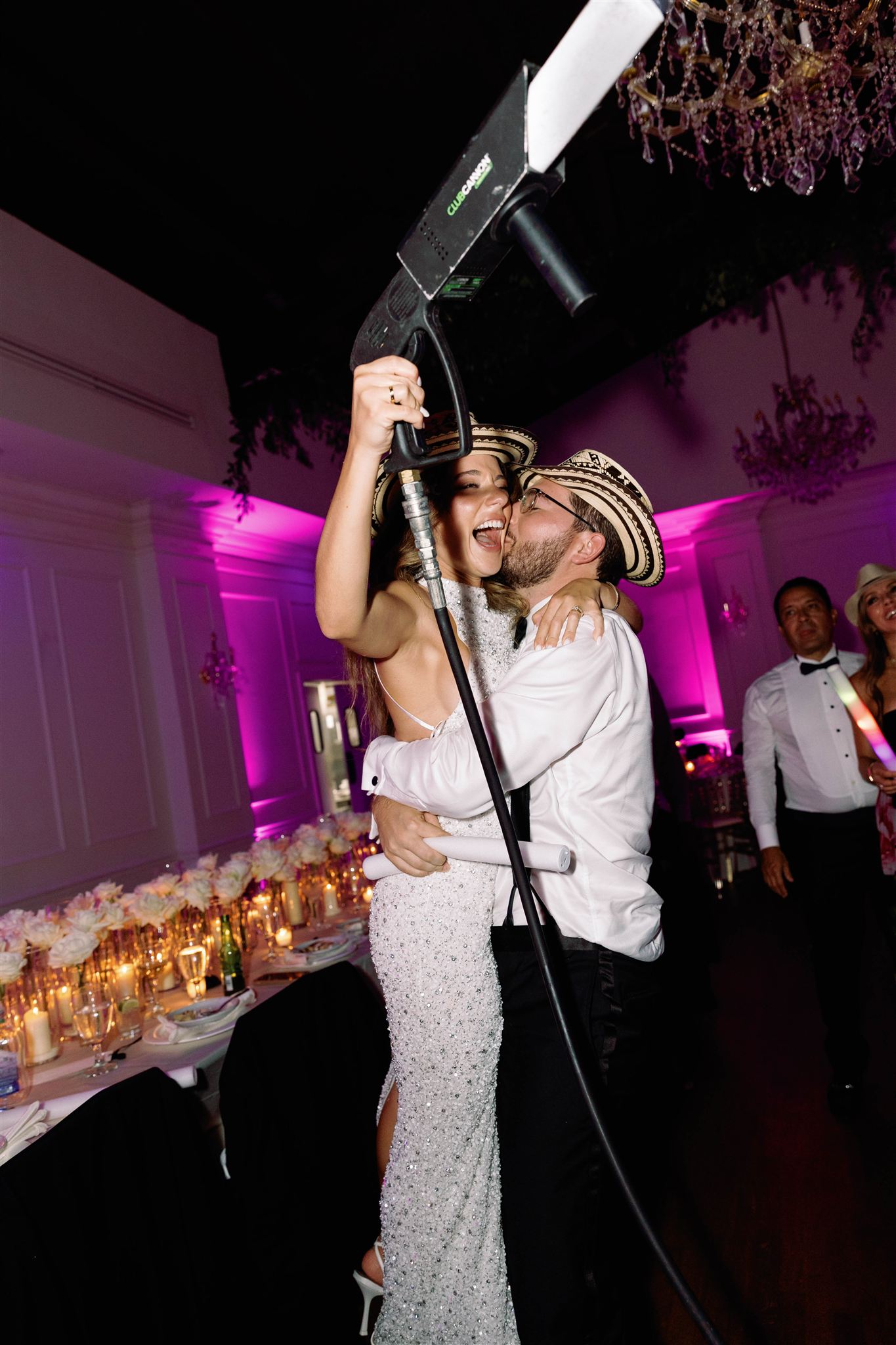 Bride and groom celebrating on the dance floor at the end of the night
