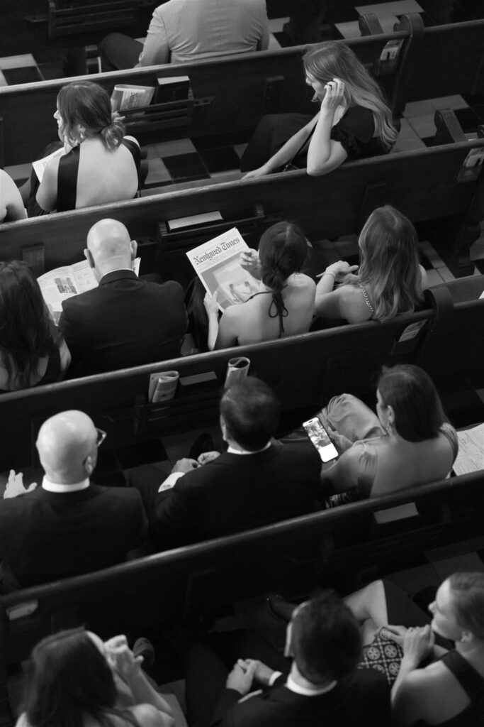Guests seated in the church pews