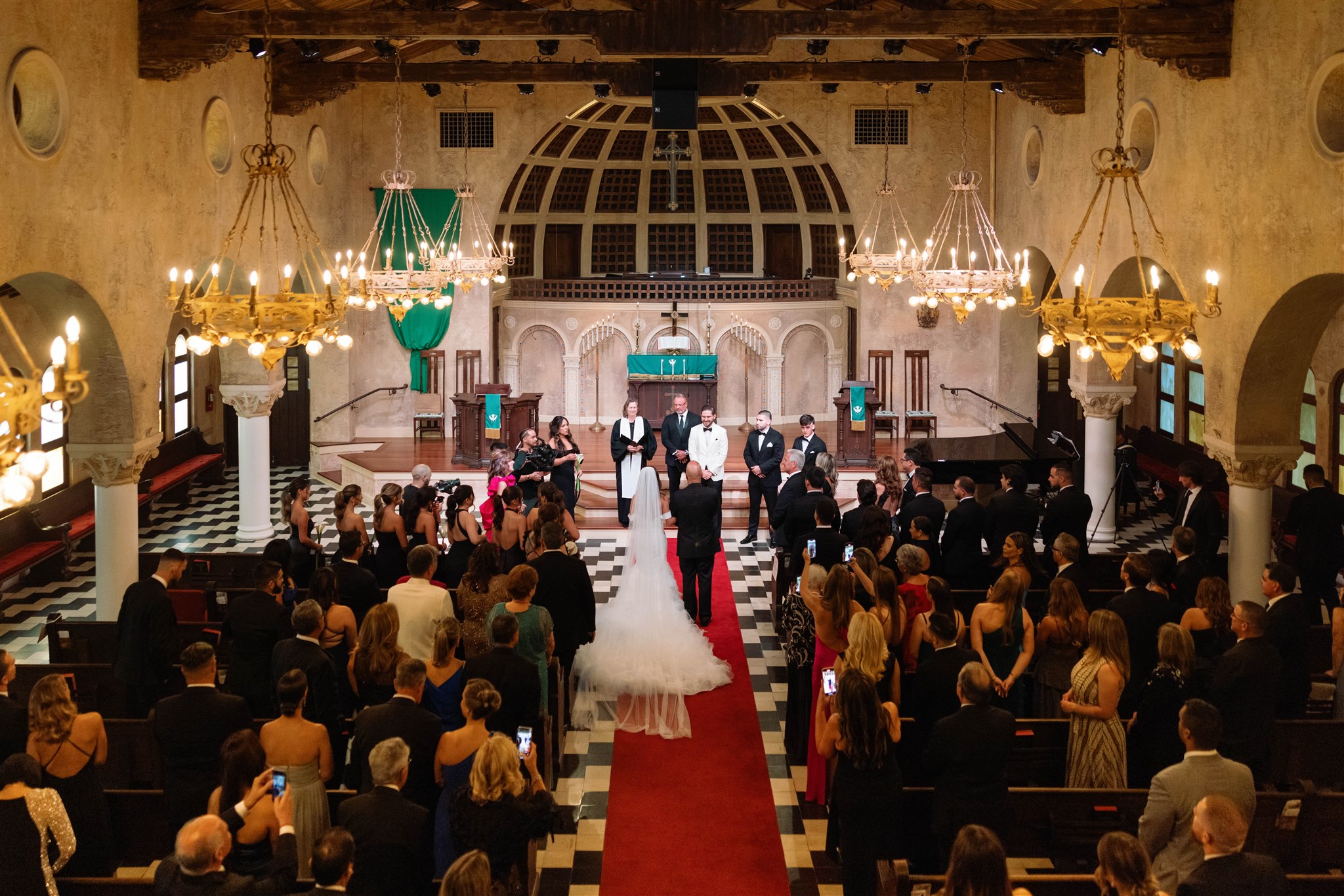 Bride walking down the aisle at the Coral Gables Congregational Church