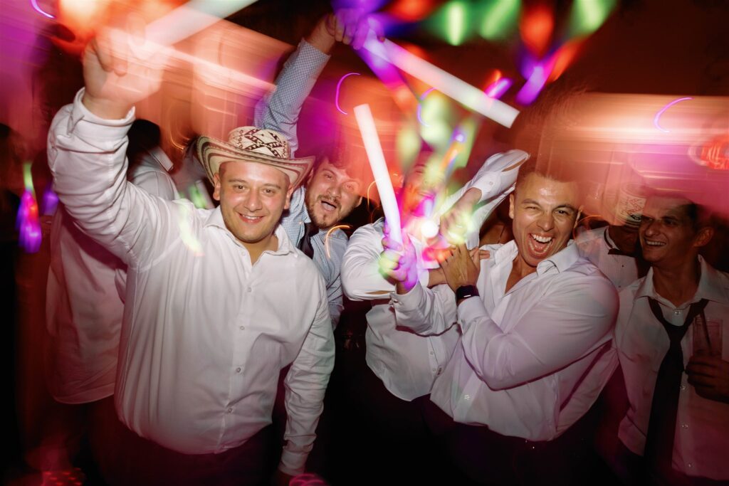 Guests partying with light-up sticks