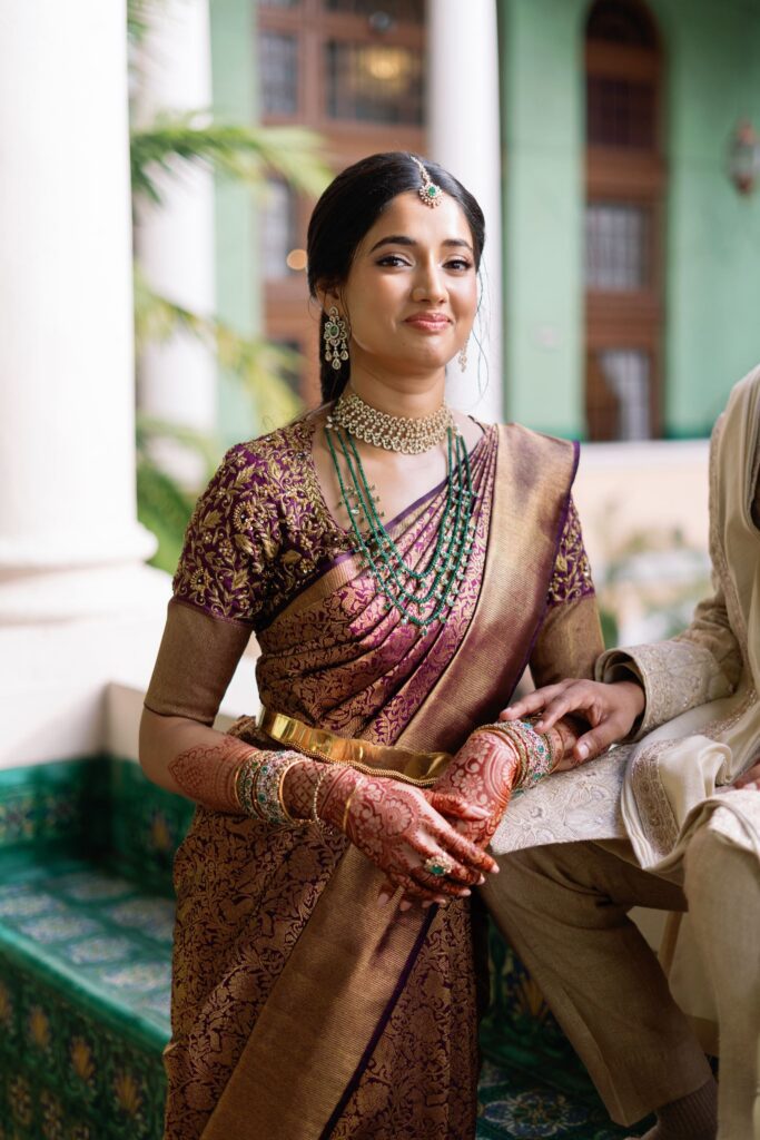 Advaitaa smiling with her hands clasped beside Tejus