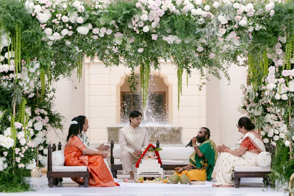 Family seated on the mandap before the ceremony begins