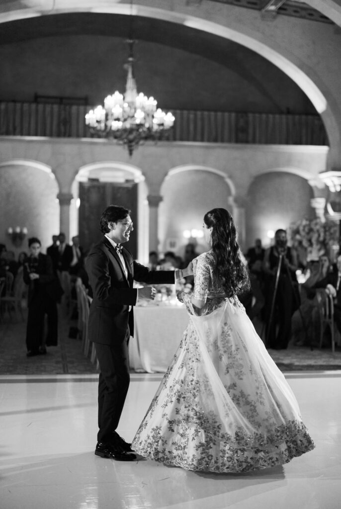 Black and white first dance in the ballroom