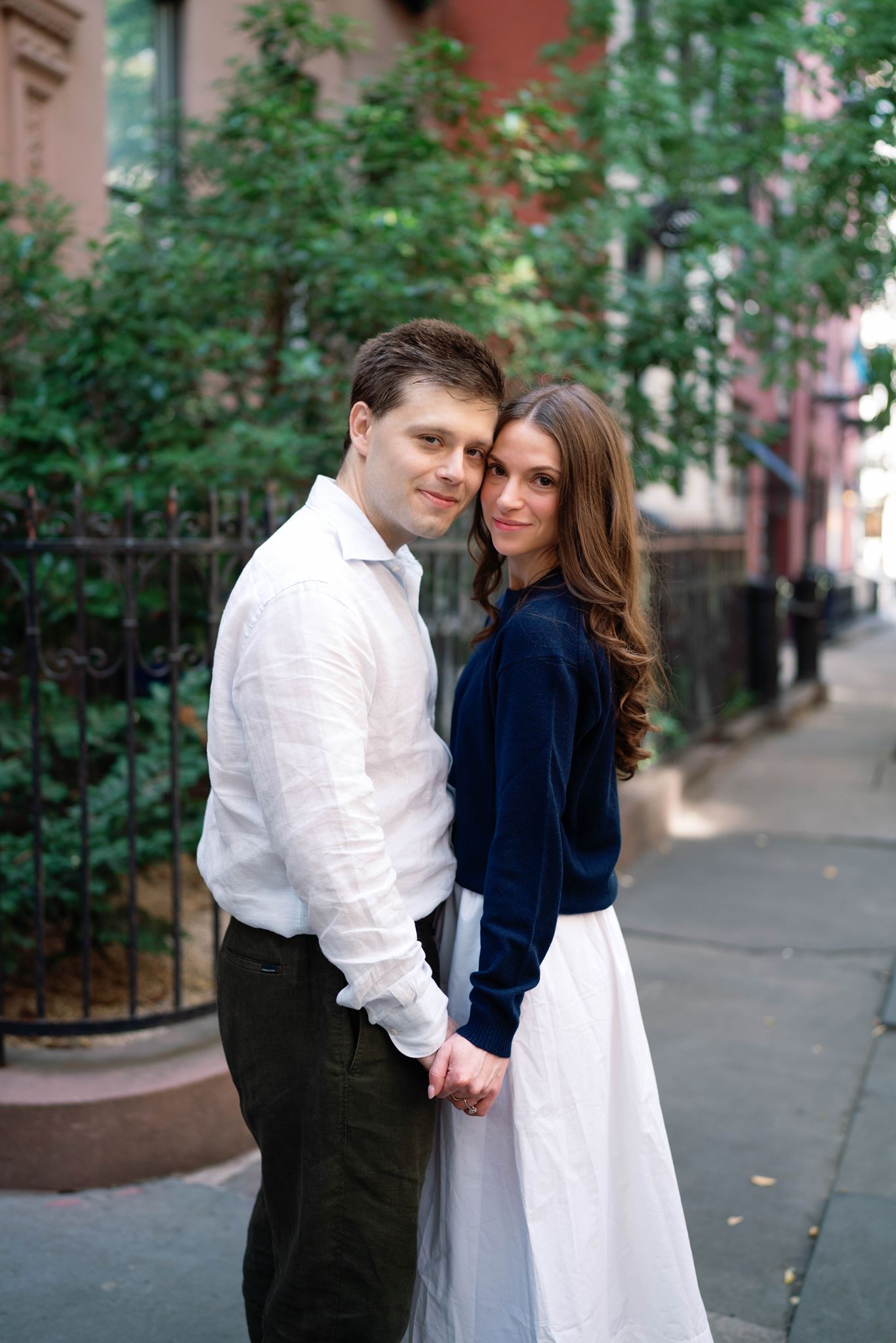 Haley and Jeremy holding hands in the streets of West Village, New York City