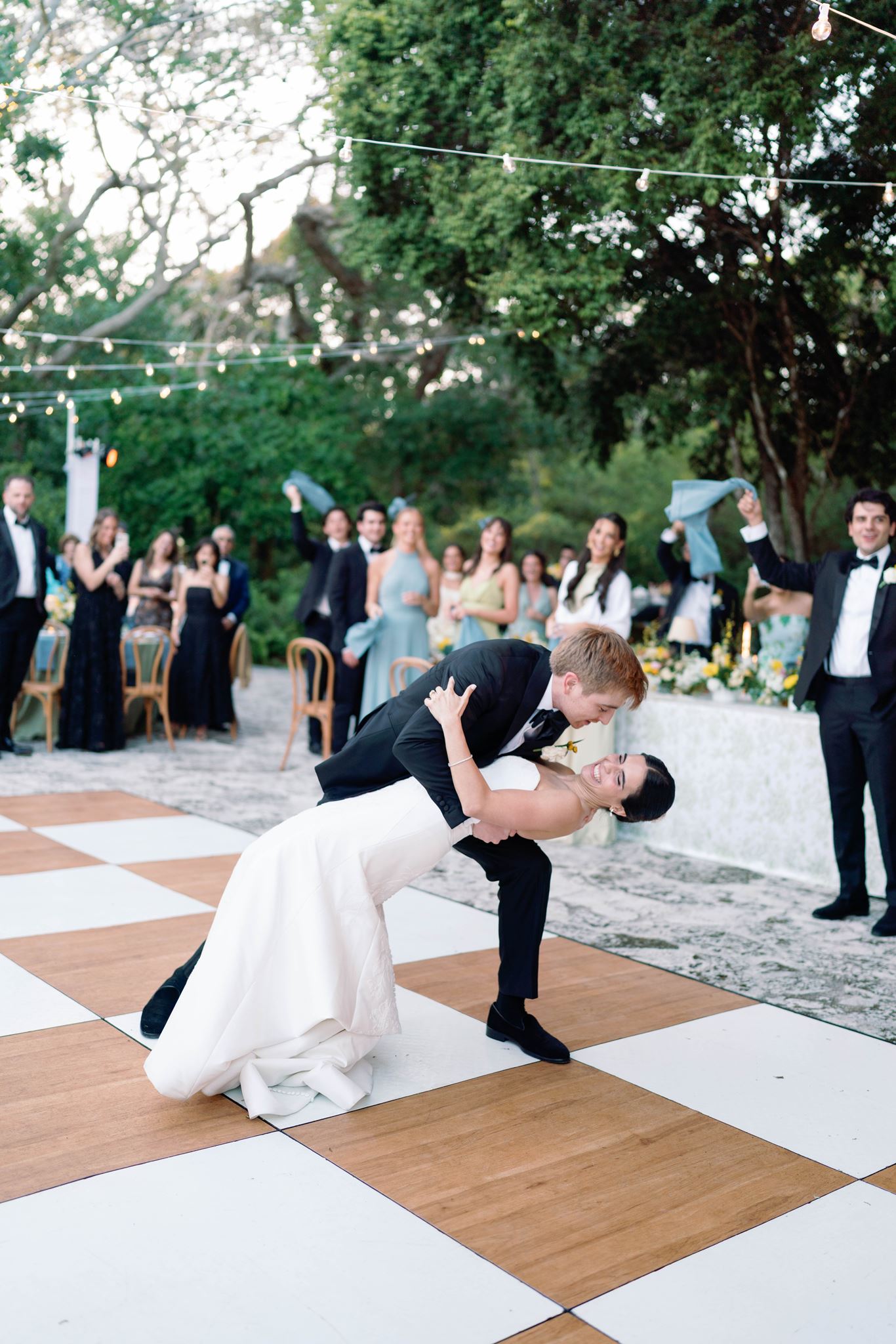 Luke dipping Ashley during their first dance at the Deering Estate